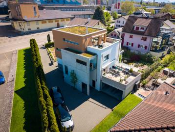 Exklusives 4.5-Zimmer Haus mit einer Einliegerwohnung an familienfreundlicher und zentraler Lage in Sursee / LU - Bild# 1